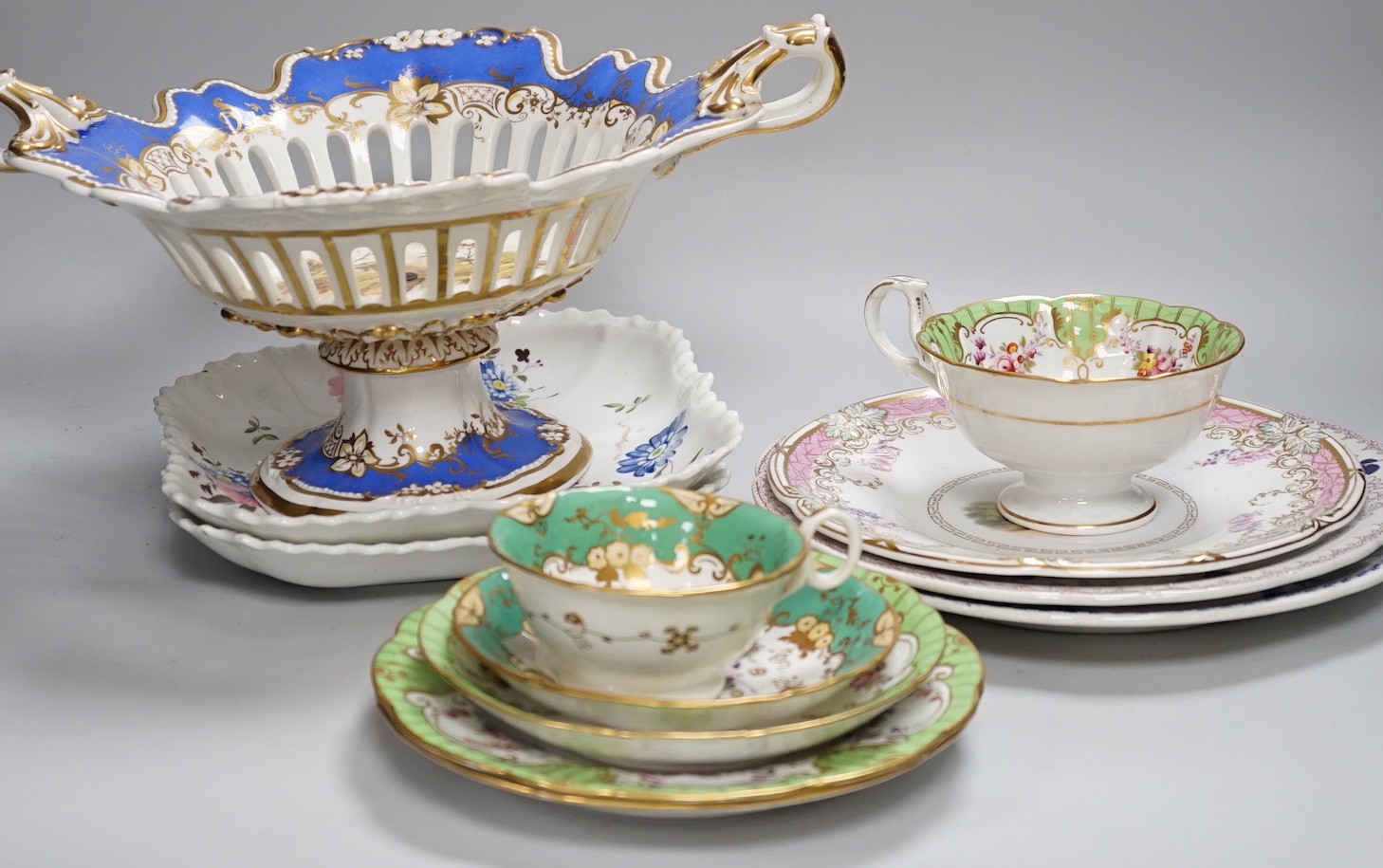 An English porcelain two handled pierced pedestal dish, c.1840 and 19th century English tea and dessert wares, dish 35cms wide